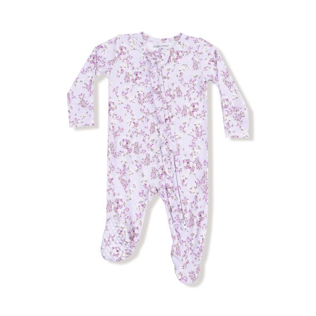 Floral patterned baby onesie on a white background