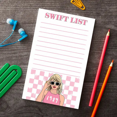 Taylor Swift notepad. It says "swift list" at the top with a painted picture of Taylor at the top. 