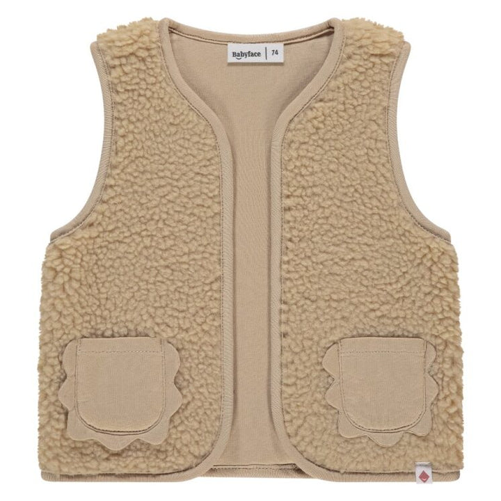 Beige fleece vest with two front pockets on a white background