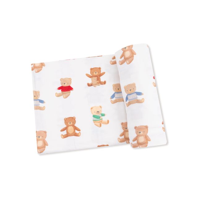 baby swaddle with teddy bear print on the swaddle 