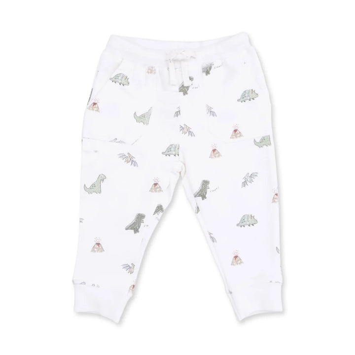 White children's jogger pants with an all-over print of small dinosaurs and teepees, featuring an elastic waistband with a white drawstring and ribbed ankle cuffs.