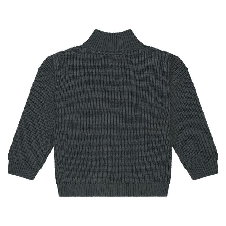 Dark gray ribbed sweater on a white background