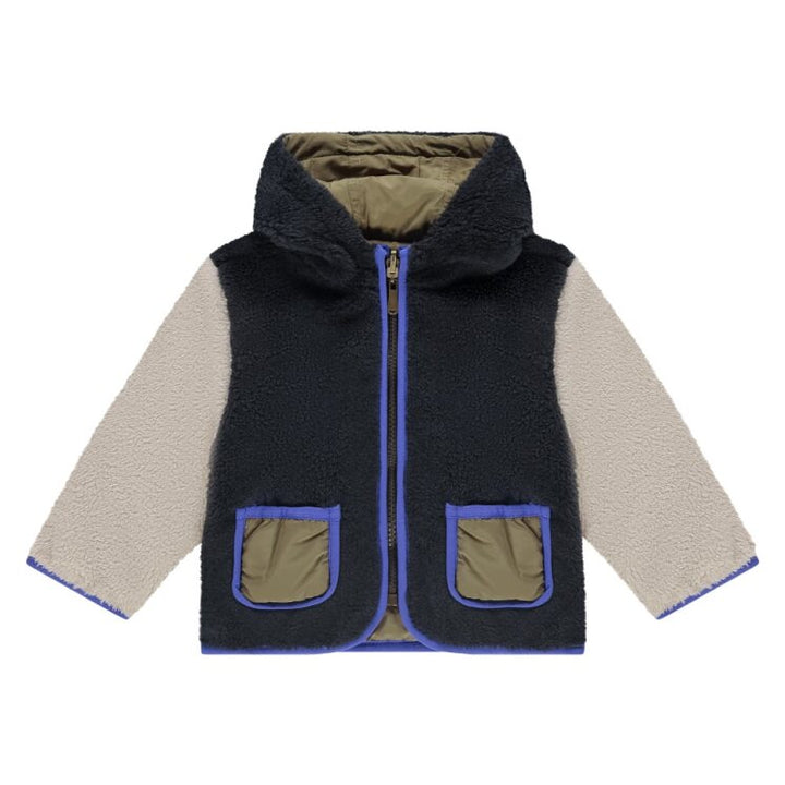 Children's two-tone jacket with black and beige sections on a white background