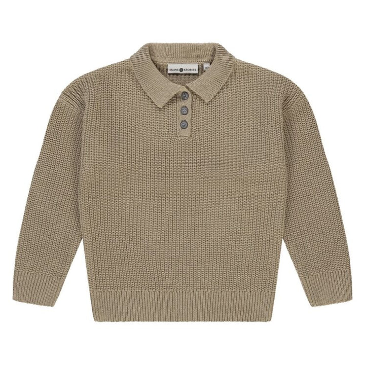 Beige knitted polo sweater with a collar on a white background