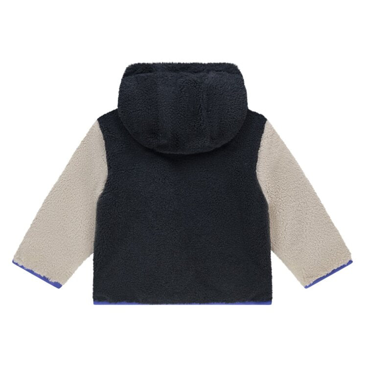 Back view of a black and beige fleece jacket on a white background