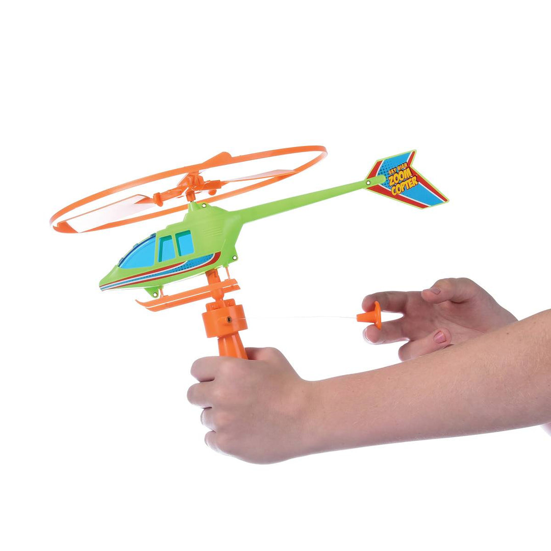 this shows you the helicopter attached to the handle in a different colorway- green with orange. 