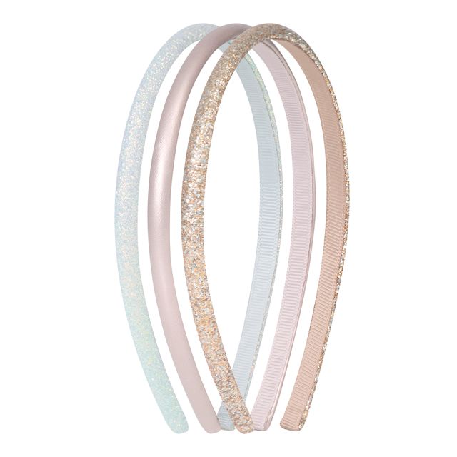 Set of three pastel-colored headbands on a white background