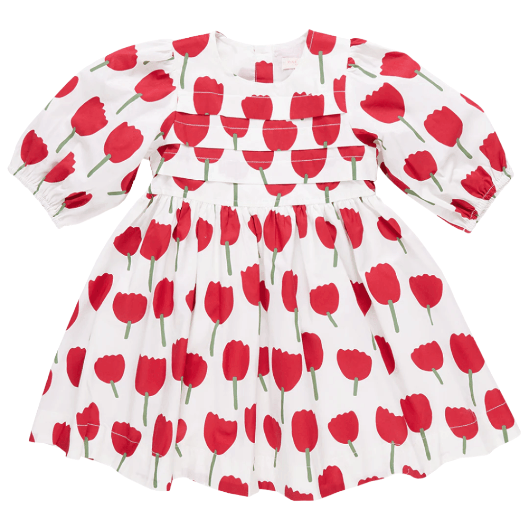 3/4 sleeve dress with balloon sleeves and pleats across the chest.  white background with big red tulips all over. 