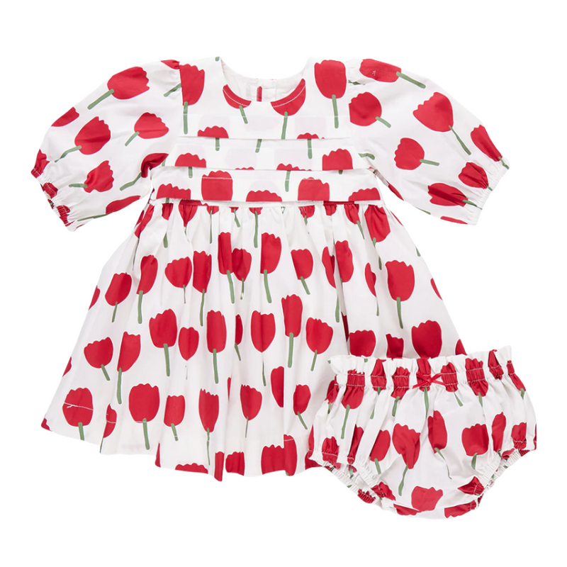 baby dress, 3/4 sleeves, white background with red tulips . small pleats across the chest. 