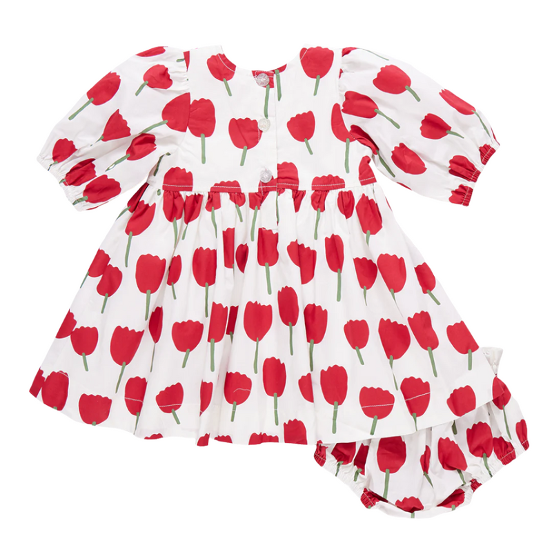 back of dress, 3/4 sleeves balloon shaped. White background with large red tulips all over. 3 big buttons on the back. 