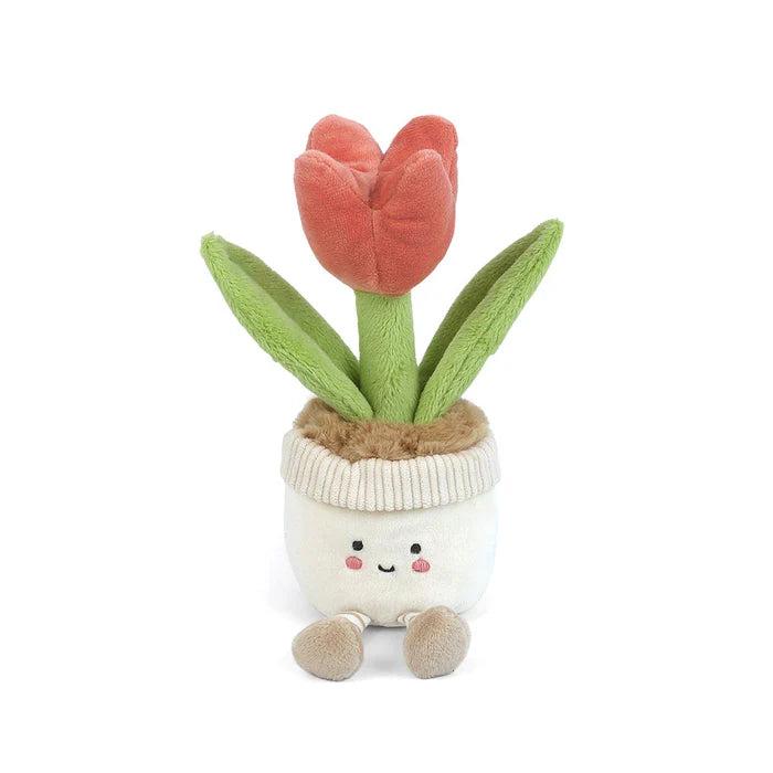 Plush tulip toy with a smiling face on a white background