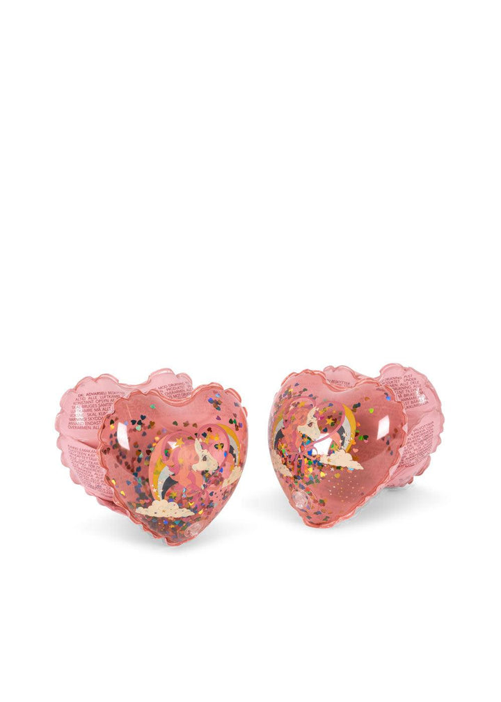 the set of water wings in the shape of a heart with confetti inside and glitter on the inside. unicorn on the front. 