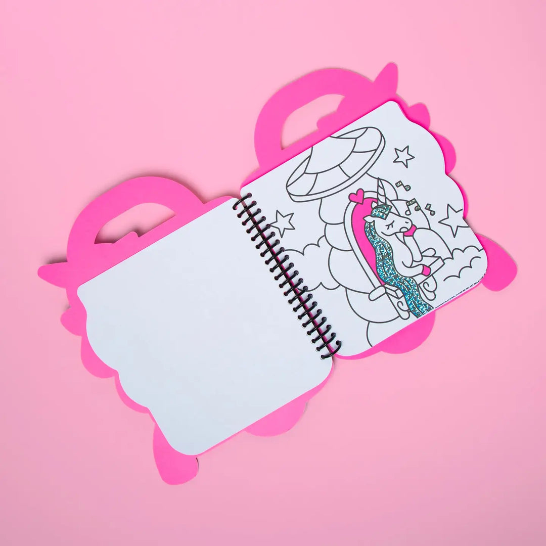 inside pages of a coloring book with a unicorn
