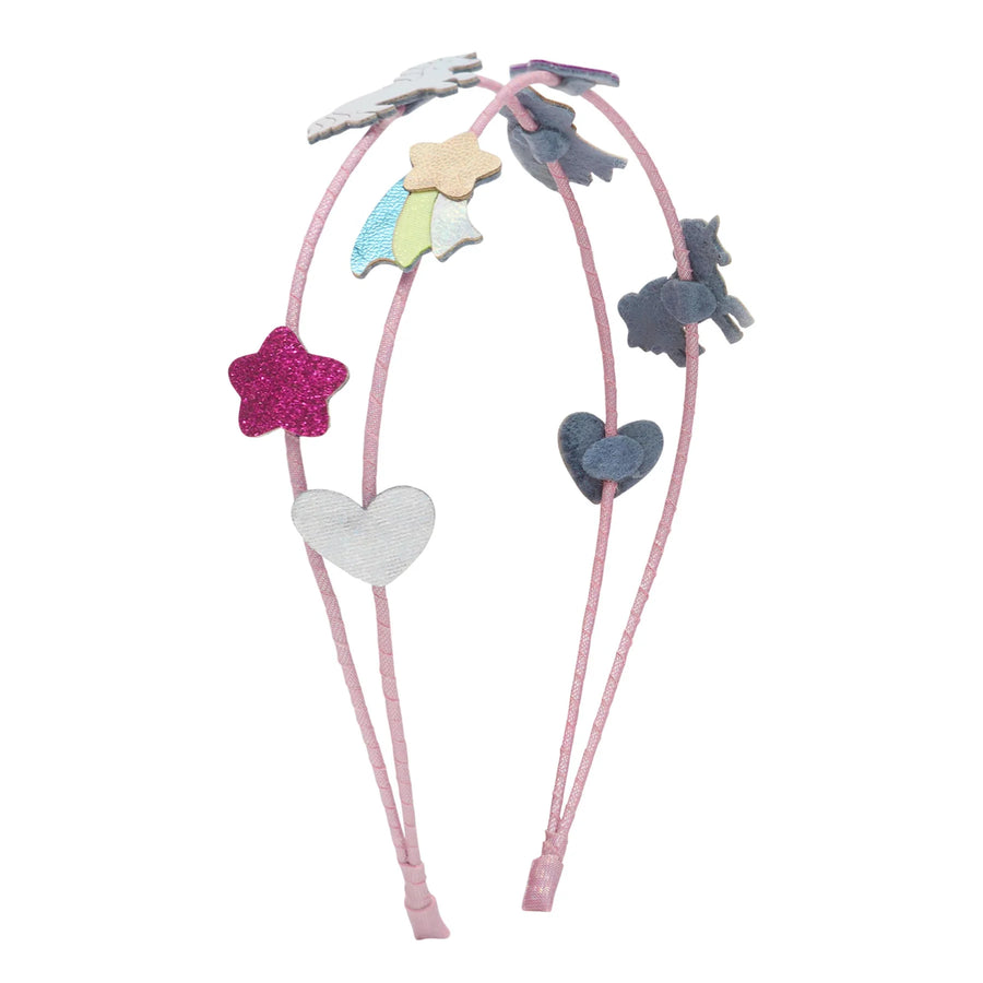 A pink headband with multiple small felt decorative shapes including stars, hearts, a unicorn, and a shooting star in assorted pastel and bright colors, shown on a plain white background.