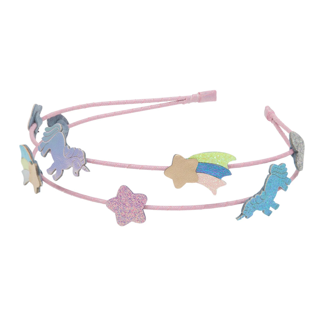 A pink elastic headband decorated with glittery, pastel-colored unicorn and star charms, shown against a plain white background.
