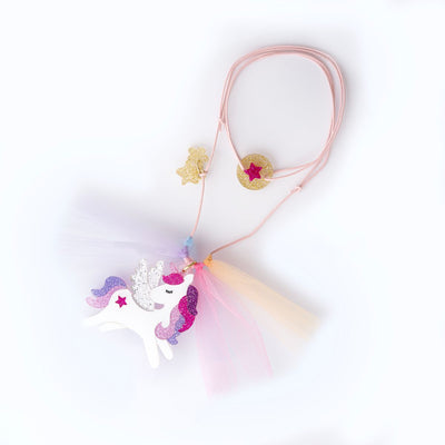 unicorn charm attached to a cord with tulle on either end of the unicorn. unicorn necklace. 