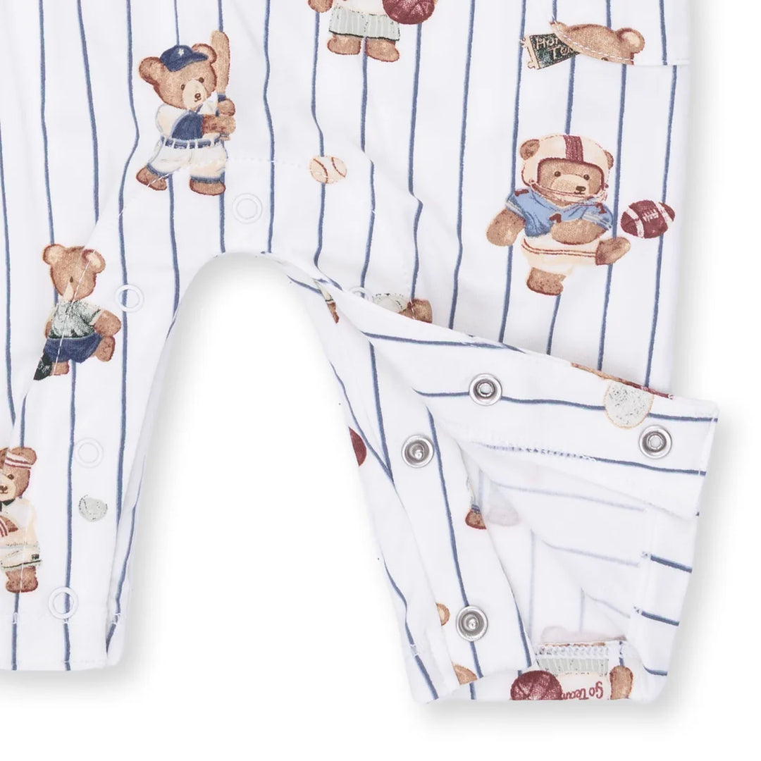 White henly romper with teddy bear pattern on a white background