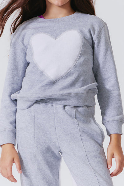 Girl Wearing Grey Crew Neck Sweatshirt  with Embroidered Light Grey Heart from Tereze