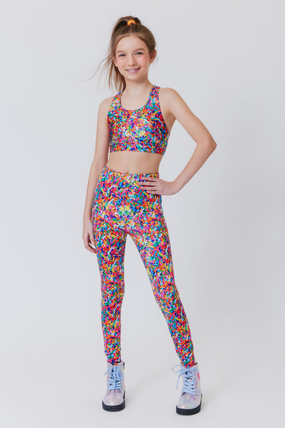 Girl Wearing Terez Rainbow Sprinkle Print legging