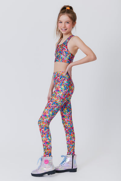 Girl Wearing Terez Rainbow Sprinkle Print legging