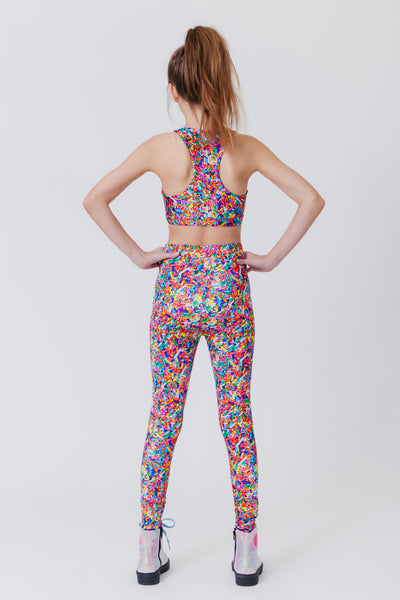 Girl Wearing Terez Rainbow Sprinkle Print legging