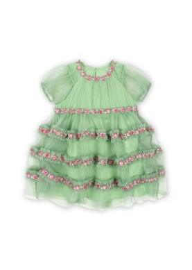 green tulle dress with pink floral appliques creating stripes along the skirt of the dress. 