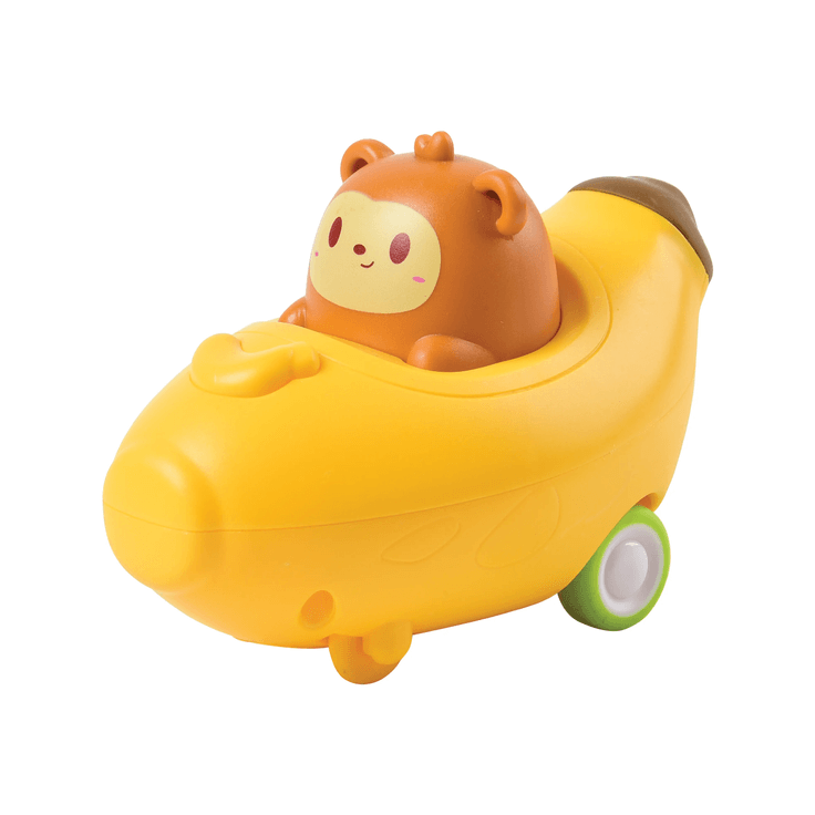 small monkey sitting in banana car with pull back capabilities 