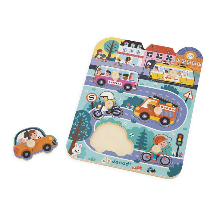 Children's puzzle with transportation-themed design and Janod branding on a white background