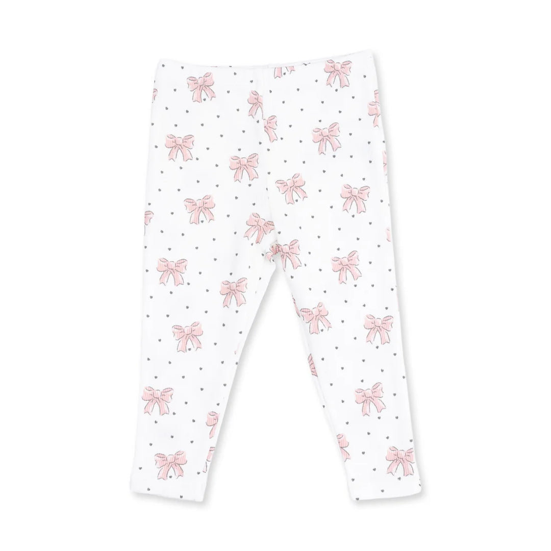 White leggings with an all-over print of pink bows and small gray polka dots, shown flat against a white background.
