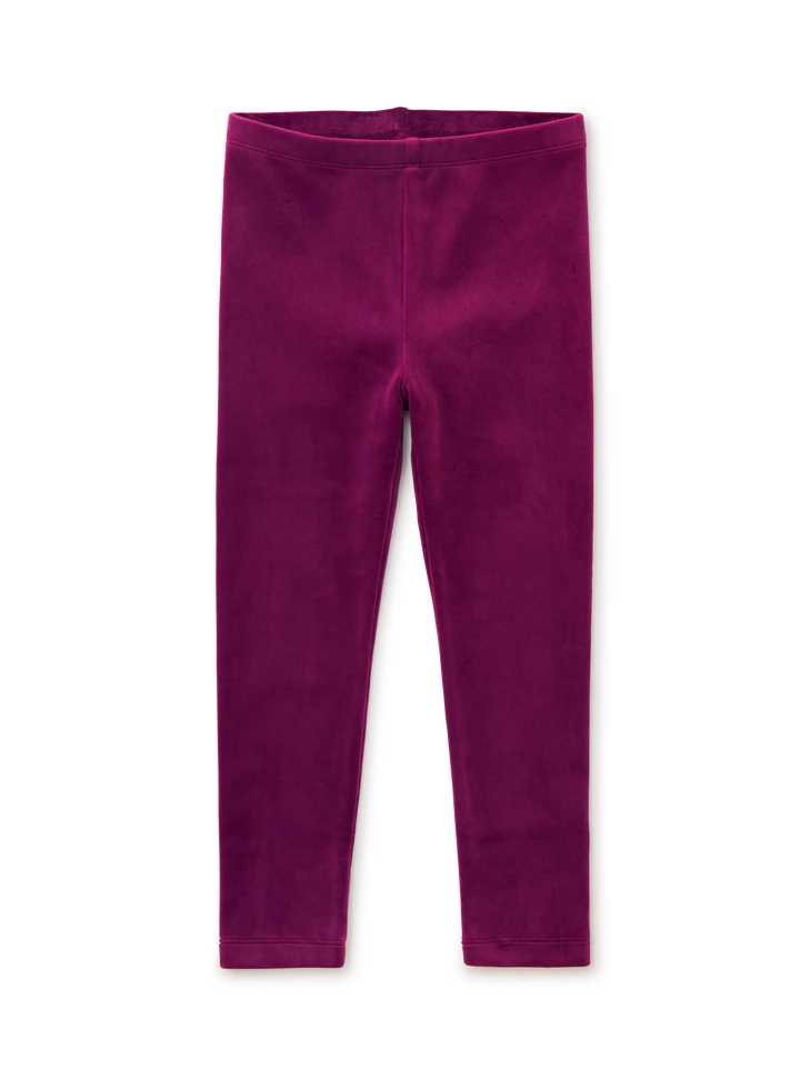 A pair of solid magenta velour leggings shown flat against a clean white background.