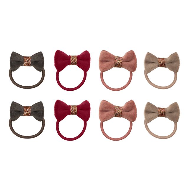 Set of eight bow-shaped hair ties in various colors on a white background
