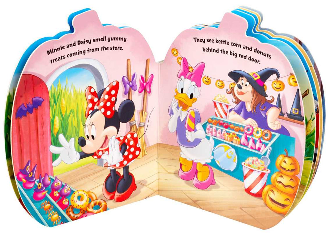 A children's pop-up book with a Halloween theme, showing two illustrated pages with Minnie Mouse and Daisy Duck in a candy store scene. The book is photographed on a plain white background.