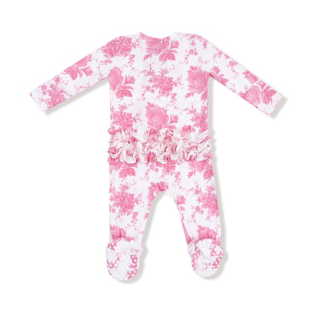Floral patterned baby onesie with ruffles on the back on a white background