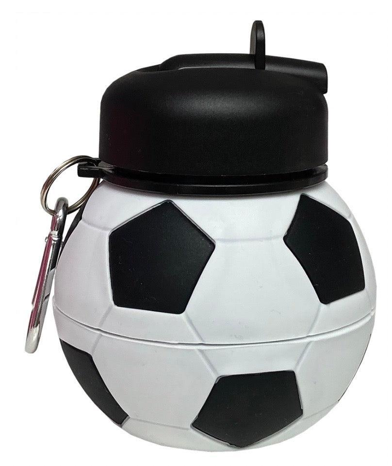 Soccer ball-shaped water bottle with black lid and keychain on a white background