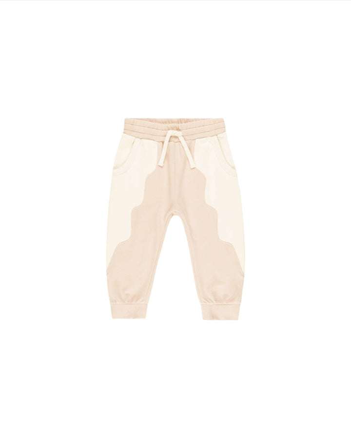 soft pink sweatpants with drawstring  with cream wavy linear design through it