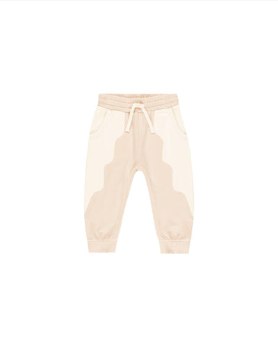 soft pink sweatpants with drawstring  with cream wavy linear design through it