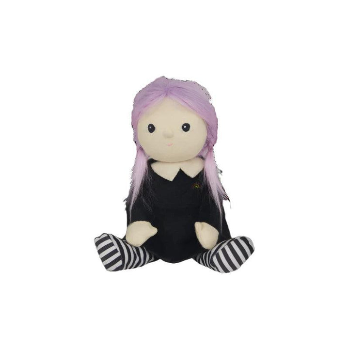 witch doll sitting on its own with lavender hair and no hat at the moment. 