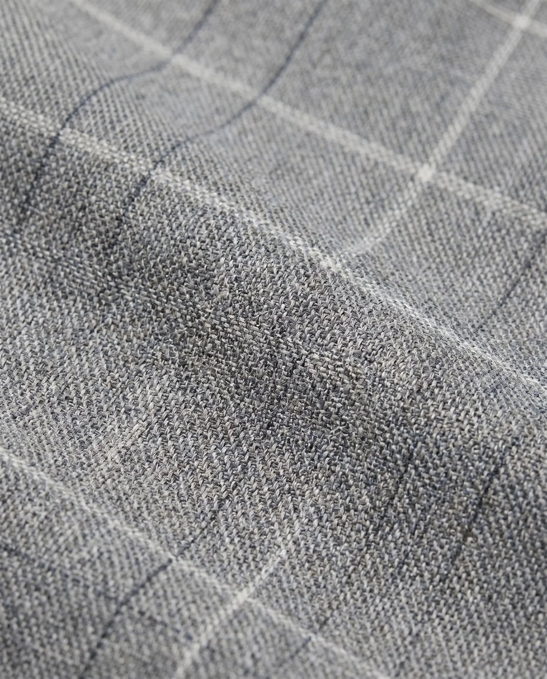 close up to the pant's texture a gray with a windowpane texture. 