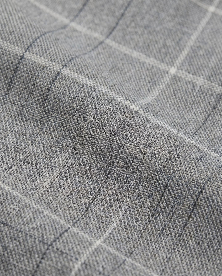 close up to the pant's texture a gray with a windowpane texture. 