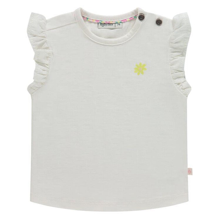 ivory tank with ruffles on the trim of the sleeves. small yellow daisy on the corner of the shirt. 