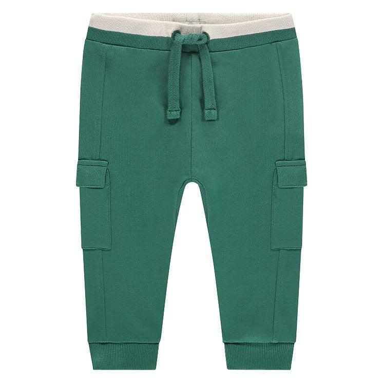 green cargos with elastic waist with drawstring. 