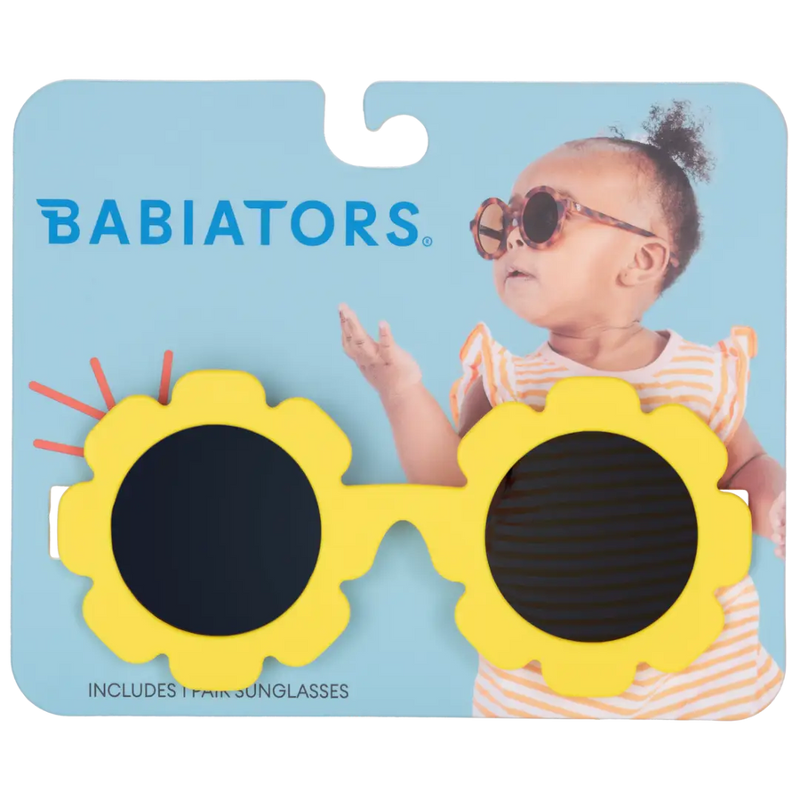 Babiators sunglasses with sunflower design on a blue card featuring a child model.