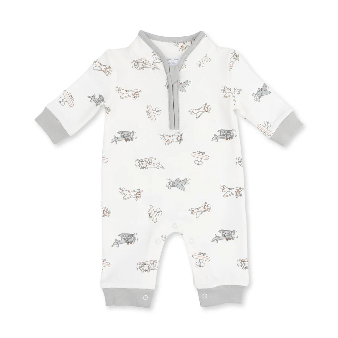 A baby long-sleeve footless romper in white with a gray and beige airplane print, featuring a gray zipper at the collar and gray cuffs.