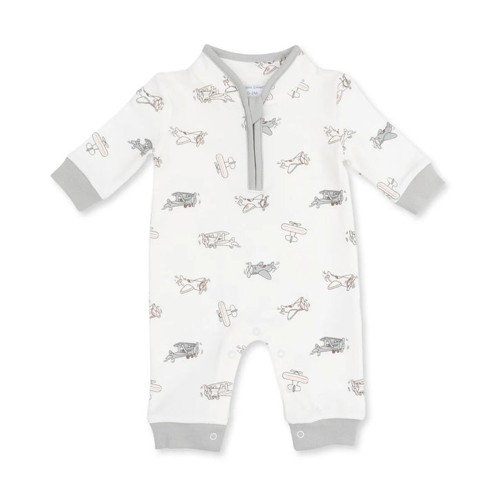 A baby long-sleeve footless romper in white with a gray and beige airplane print, featuring a gray zipper at the collar and gray cuffs.
