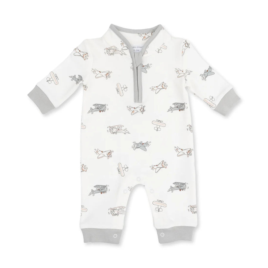 A baby long-sleeve footless romper in white with a gray and beige airplane print, featuring a gray zipper at the collar and gray cuffs.