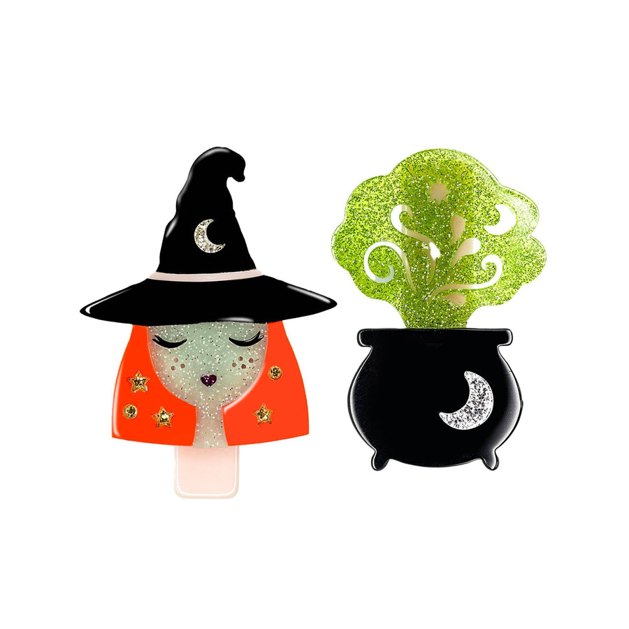 set of 2 alligator clips, one a witch with orange hair and the other a cauldron with green bubbly smoke